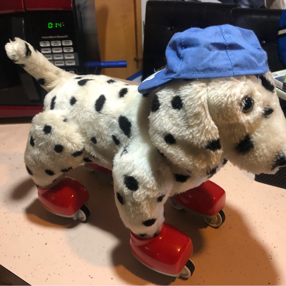 Plush Dalmatian Dog Toy with Blue Cap and Red Roller Shoes
